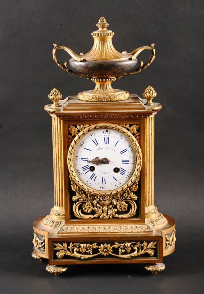 Pendule borne de cheminée Louis XVI en bronze doré