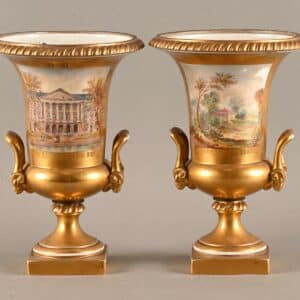 Paire de vases médicis en porcelaine de Bruxelles signée L.C.