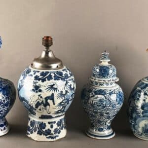 Lot composé de 4 pièces de formes en faïence